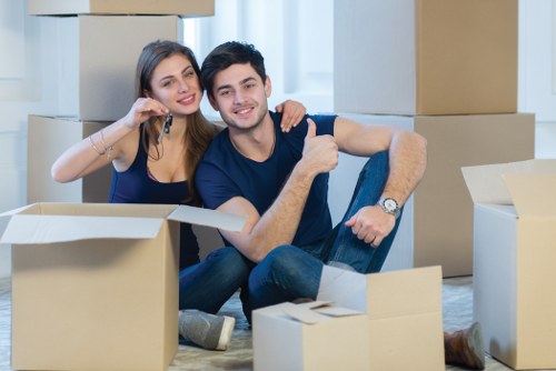 House removals team preparing furniture for a move in Shadwell